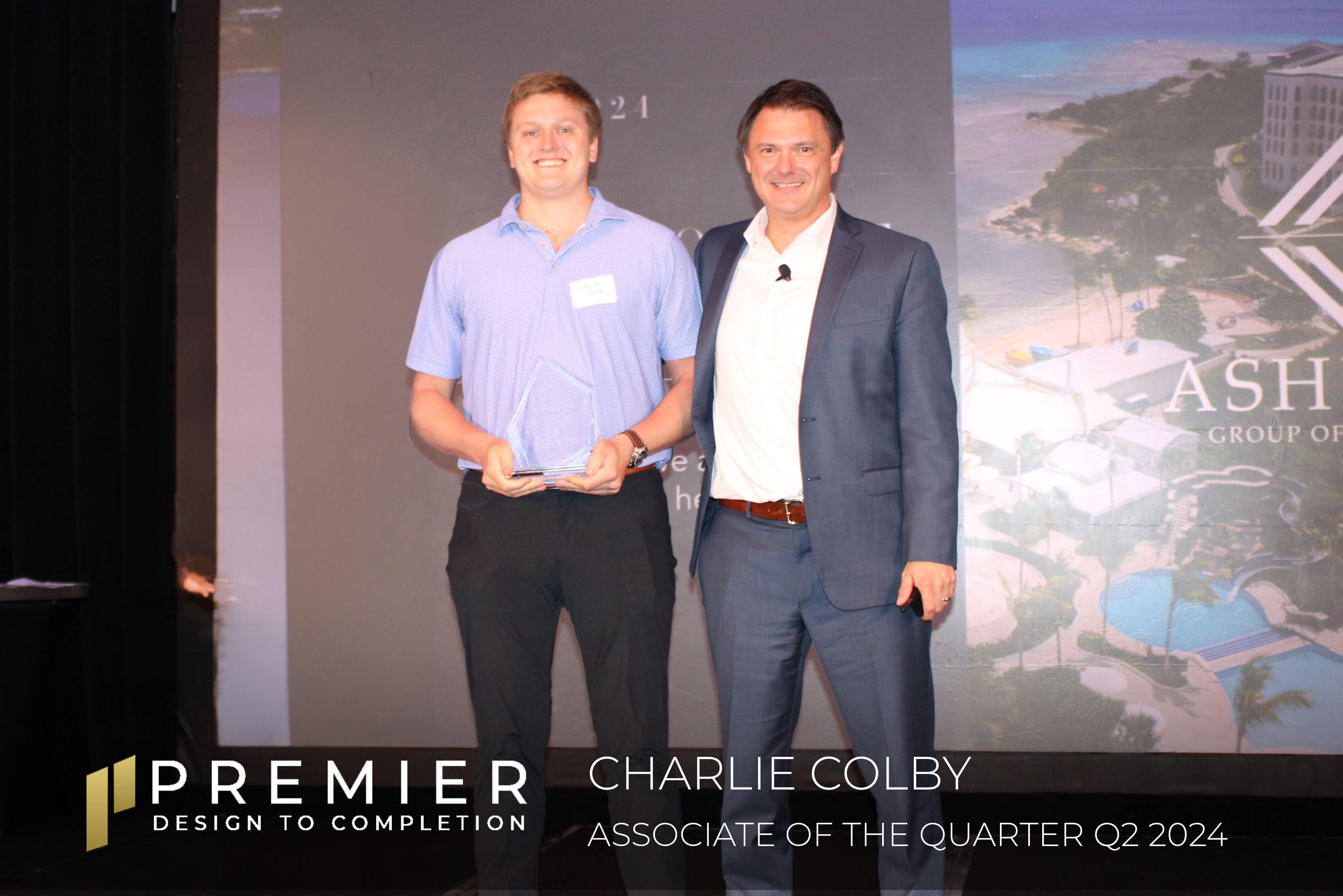 Premier Chief Operations Officer Johannes Michalsky awards Charlie Colby as the Q2 AOQ