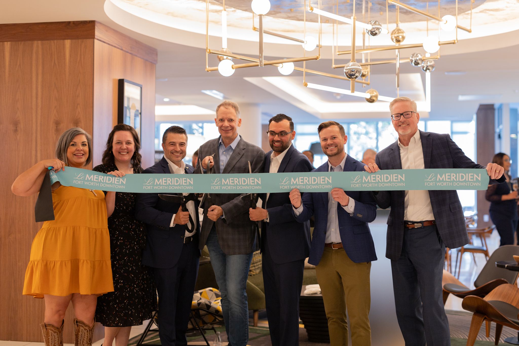 The ribbon cutting ceremony of the Le Meridien Fort Worth Downtown, a hotel development by Premier