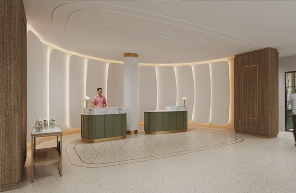 a man standing behind a reception desk